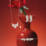 Pendientes de aro de plata esterlina "Rosa floreciente"