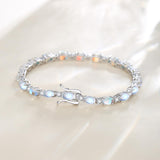 "Resplandor Glamuroso" Pulsera de Tenis de Plata de Ley con Piedra de Nacimiento de Junio y Piedra Lunar Corte Fancy
