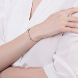 Pulsera de tenis de plata de ley FANCIME Halo Corazón con piedra de nacimiento de octubre de ópalo