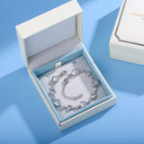 Pulsera de tenis de plata de ley FANCIME Halo Corazón con piedra de nacimiento de junio de piedra lunar