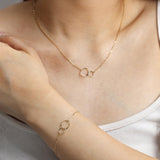 Pulsera de oro sólido 14K con dos infinitos entrelazados de eternidad de FANCIME