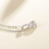 Collar solitario FANCIME Moissanite Infinity Ribbon en oro blanco de 14K
