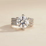 Anillo de plata de ley con moissanita talla redonda y piedras laterales de FANCIME