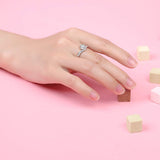 Anillo de plata de ley con moissanita Royal Sparkle de FANCIME