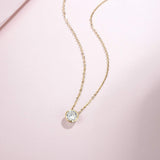 Collar solitario con moissanita engastada en bisel de oro amarillo 14K de FANCIME