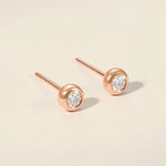 18k diamond stud with engraved stamp